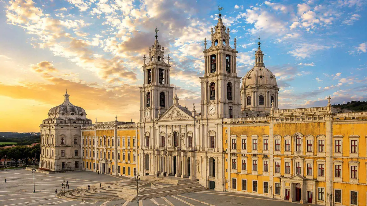 The basilica facade of Mafra National Palace on a Mafra and Ericeira day trip from Lisbon, Portugal